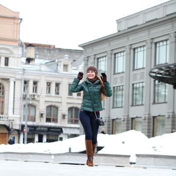 Full length, Walking woman in autumn Moscow street