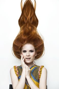 Portrait of girl with beautiful red hair