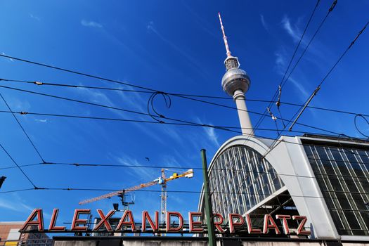 Alexanderplatz sign and Television tower, German Fernsehturm. Berlin, Germany