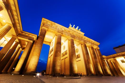 Brandenburg Gate. German Brandenburger Tor in Berlin, Germany. Illumination at night
