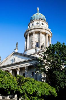 The Gendarmenmarkt. German Cathedral in Berlin, sunny blue sky