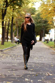 Beautiful woman walking in park