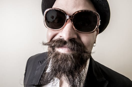 long beard and mustache hipster with elegant suit