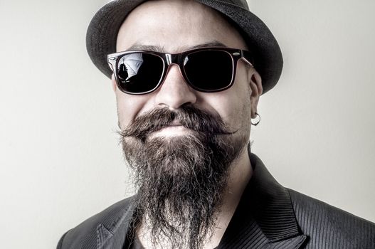 long beard and mustache hipster with elegant suit