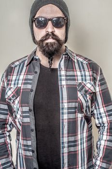 long beard and mustache hipster with elegant suit 