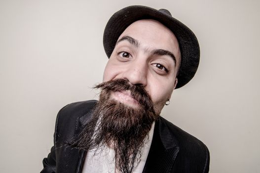 long beard and mustache hipster with elegant suit 