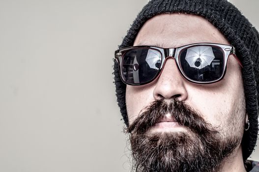 long beard and mustache hipster with elegant suit 