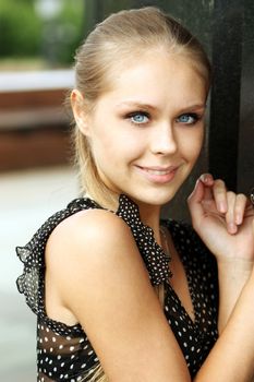 Beautiful young blonde woman. Outdoor portrait