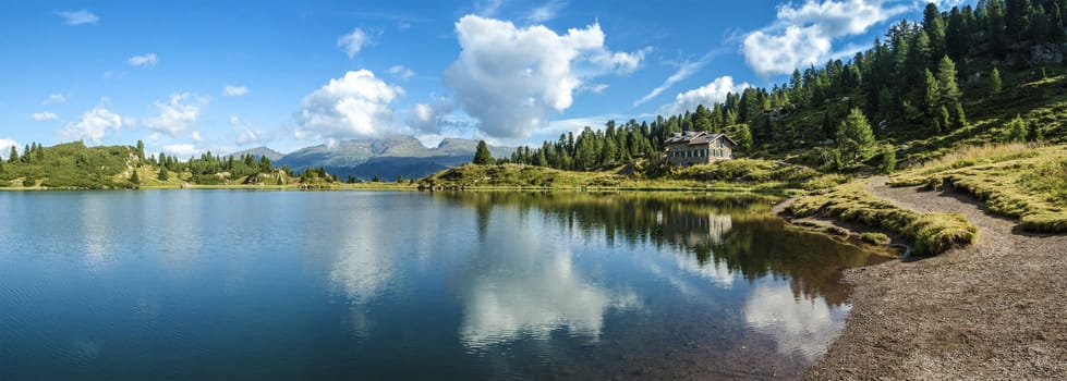 view of the lake Colbricon near the Rolle pass, Dolomites - Italy