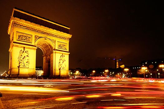 Beautiful travel photo with Arch of Triumph at Night in France