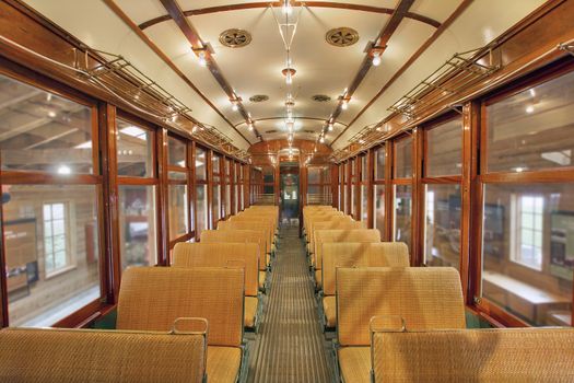 Old Historic Restored Tram Interior with Wood Bench Seats in General Public Non Smoking Section