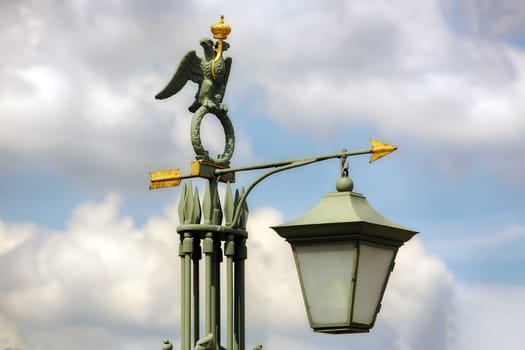 Street light on the background of the cloudy sky in St. Petersburg
