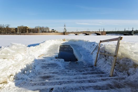 Ice-hole in Epiphany frosts in St.Petersburg, Russia