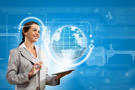 Young businesswoman with tablet pc in hands. Globalization concept