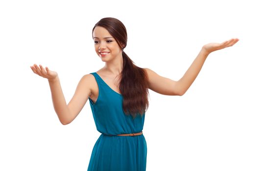 Beautiful young brunette woman in blue dress