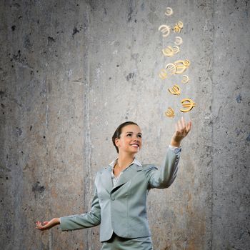 Image of young happy businesswoman. Currency concept