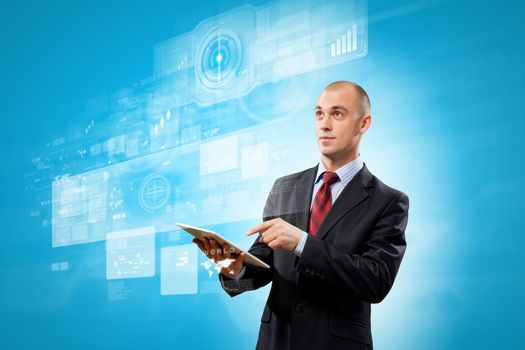 Image of businessman with tablet pc against media background