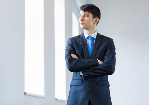 Image of handsome confident businessman in business suit