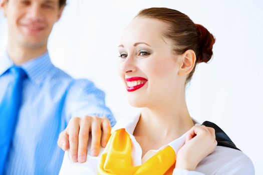 Image of businessman and businesswoman smiling joyfully