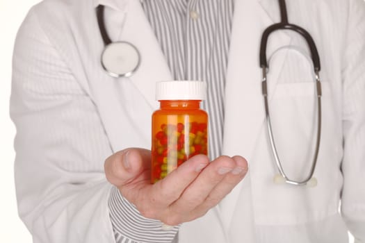 Handsome Doctor With Medication in Prescription Bottles