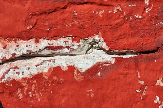  Closeup details of a red old cracked wall grunge background                              