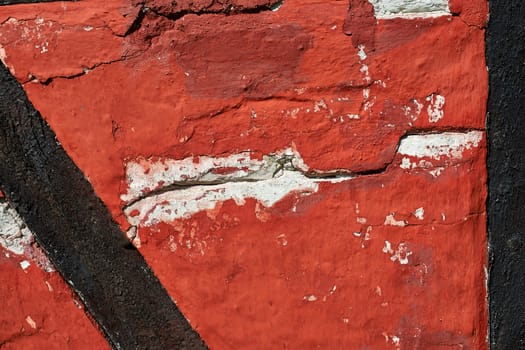 Closeup details of a red old cracked wall grunge background                                            