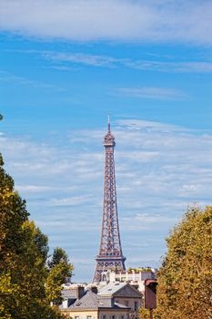 Eiffel Tower against the blue sky and clouds. Paris. France.