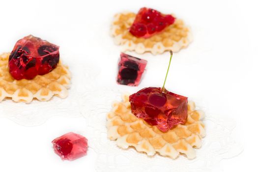 dessert consist of currant, cherry and waffles