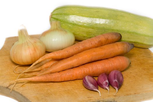 fresh vegetables on wooden table after market 