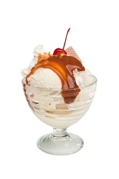 Bowl of ice cream under the caramel topping with cherry on the top