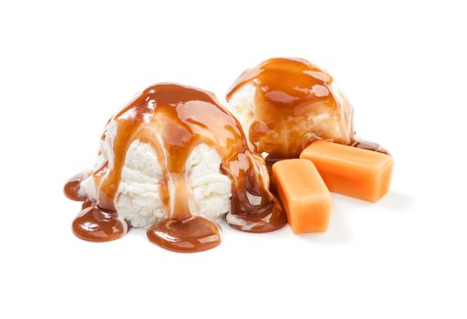 Two icecream balls under the caramel topping