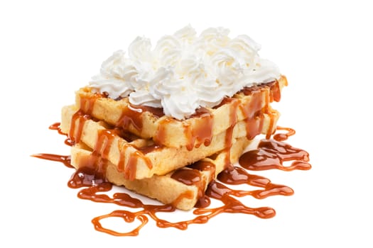 Belgian waffels under the caramel topping with cream on top