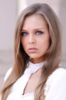 Beautiful young girl in pink dress