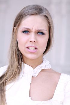 Portrait of young beautiful blond girl