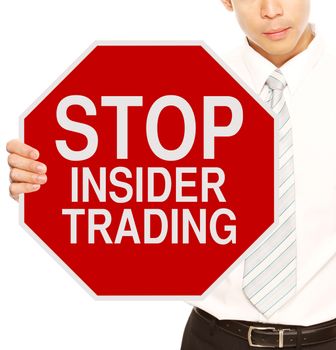 A man holding a stop sign on Insider Trading