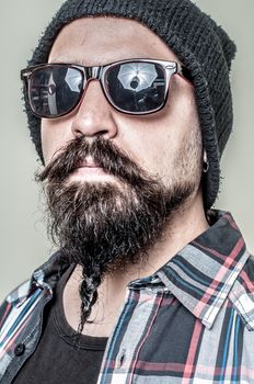 long beard and mustache hipster with elegant suit 