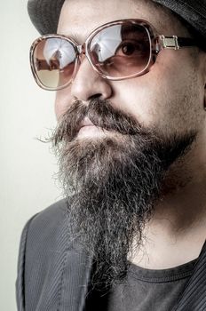 long beard and mustache hipster with elegant suit 