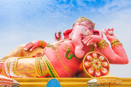 Pink ganesha in relaxing protrait on blue sky, Thailand.