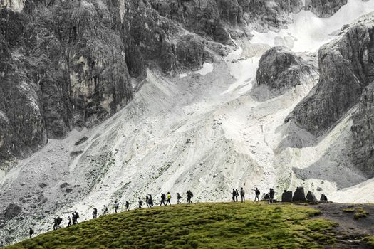 Group of hikers in summer season, Pale di San Martino - Dolomites