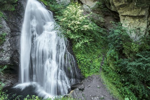 Waterfall in the forest near Cavalese, Trentino - Italy