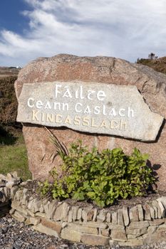 village name sign on rock in Kincasslagh county Donegal Ireland