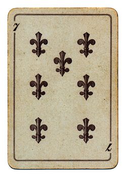 old used grunge playing card with number seven isolated on white