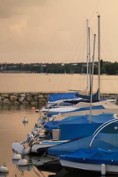 Boats and lake and sky pink