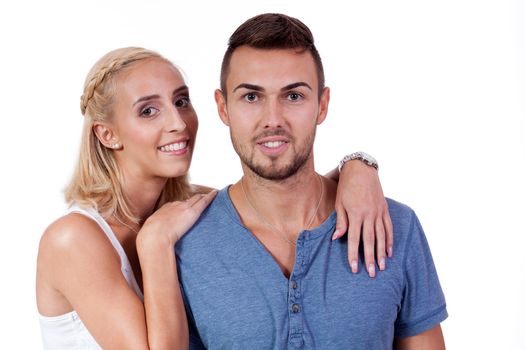 young smiling couple in love portrait isolated on white