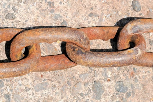 Big Old Rusty Chain on an Harbour near the Atlantic Ocean