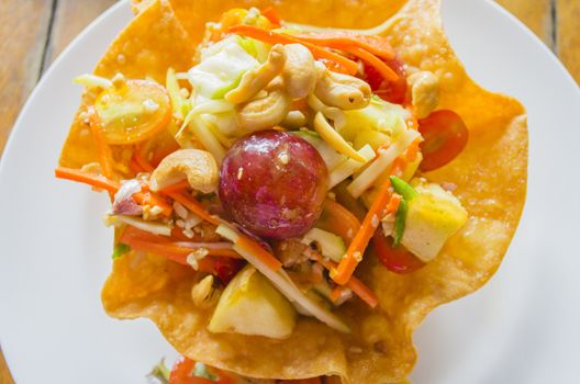 Papaya and Vegetables Salad in Crisp Flower Bowl