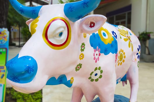 Artificial Cow with Colourful Painting Flowers