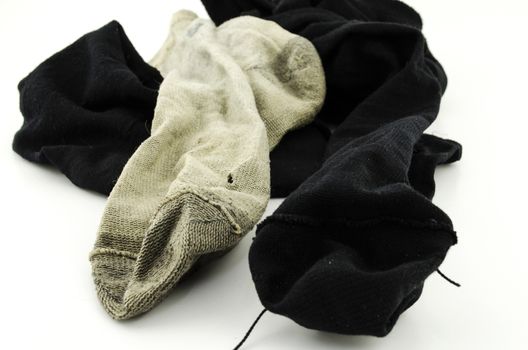 used dirty sock isolated on white background