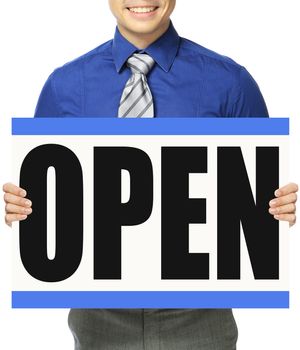 A man in shirt and tie holding a signboard indicating Open