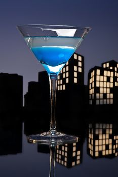 Metropolis Blue Martini cocktail in skyline setting